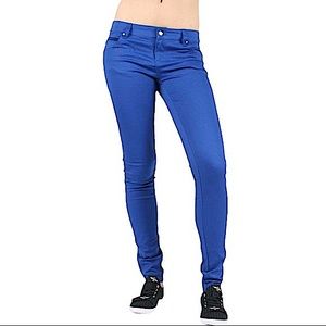 Tripp📌 size13 T back pockets solid blue some fading/wear on thighs skinny pants